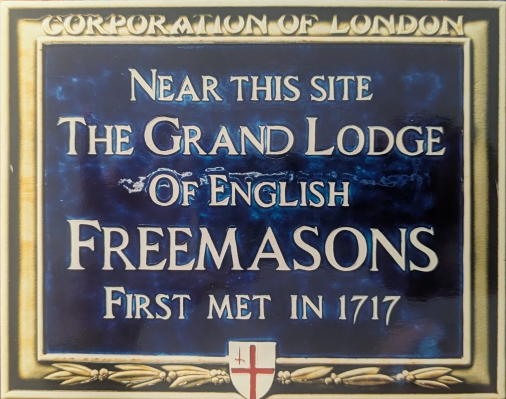 A plaque commemorating the birth of the first English Grand Lodge. It says "Corporation of London - Near this site the Grand Lodge of English Freemasons first met in 1717"